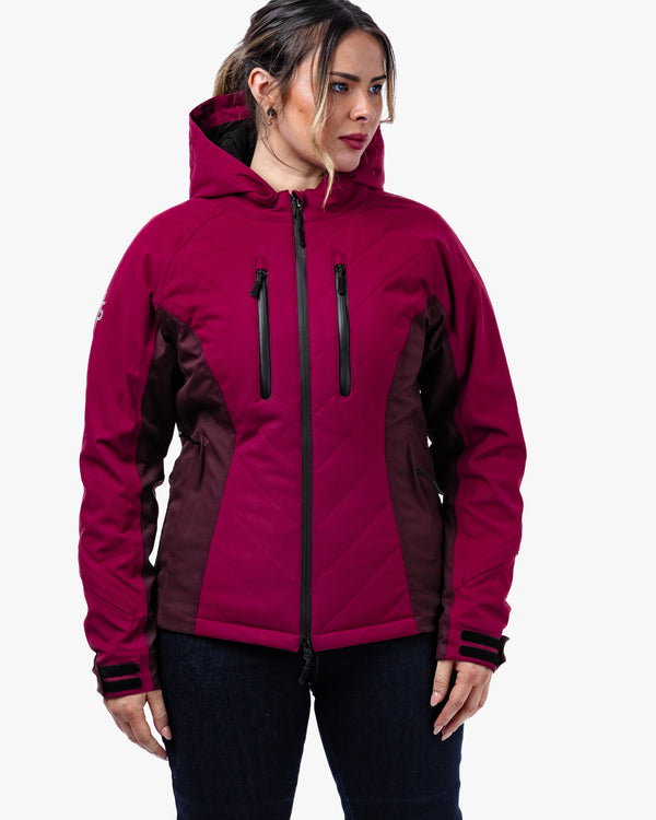 Woman wearing a red and black jacket on a white background