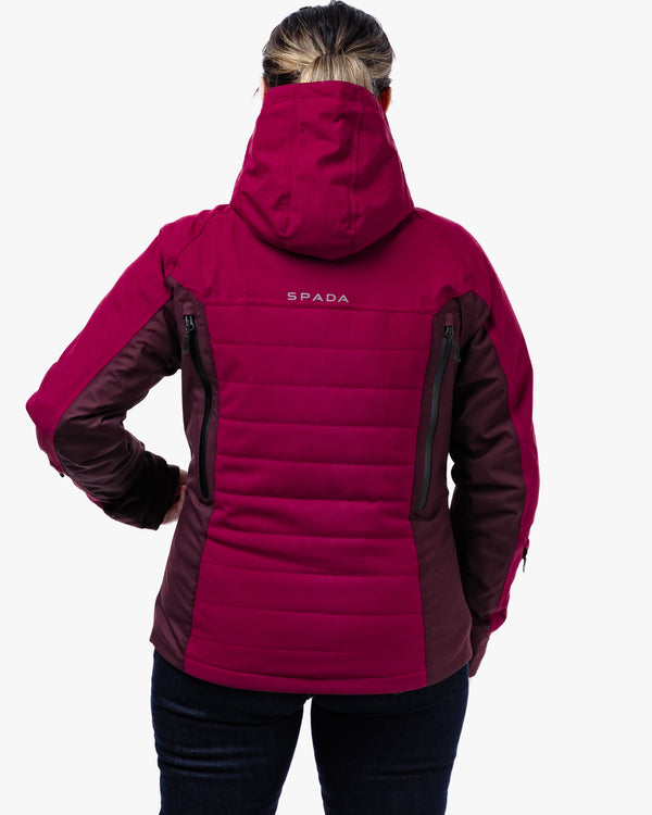 back of woman wearing a women's motorbike jacket with quilted pattern and hood