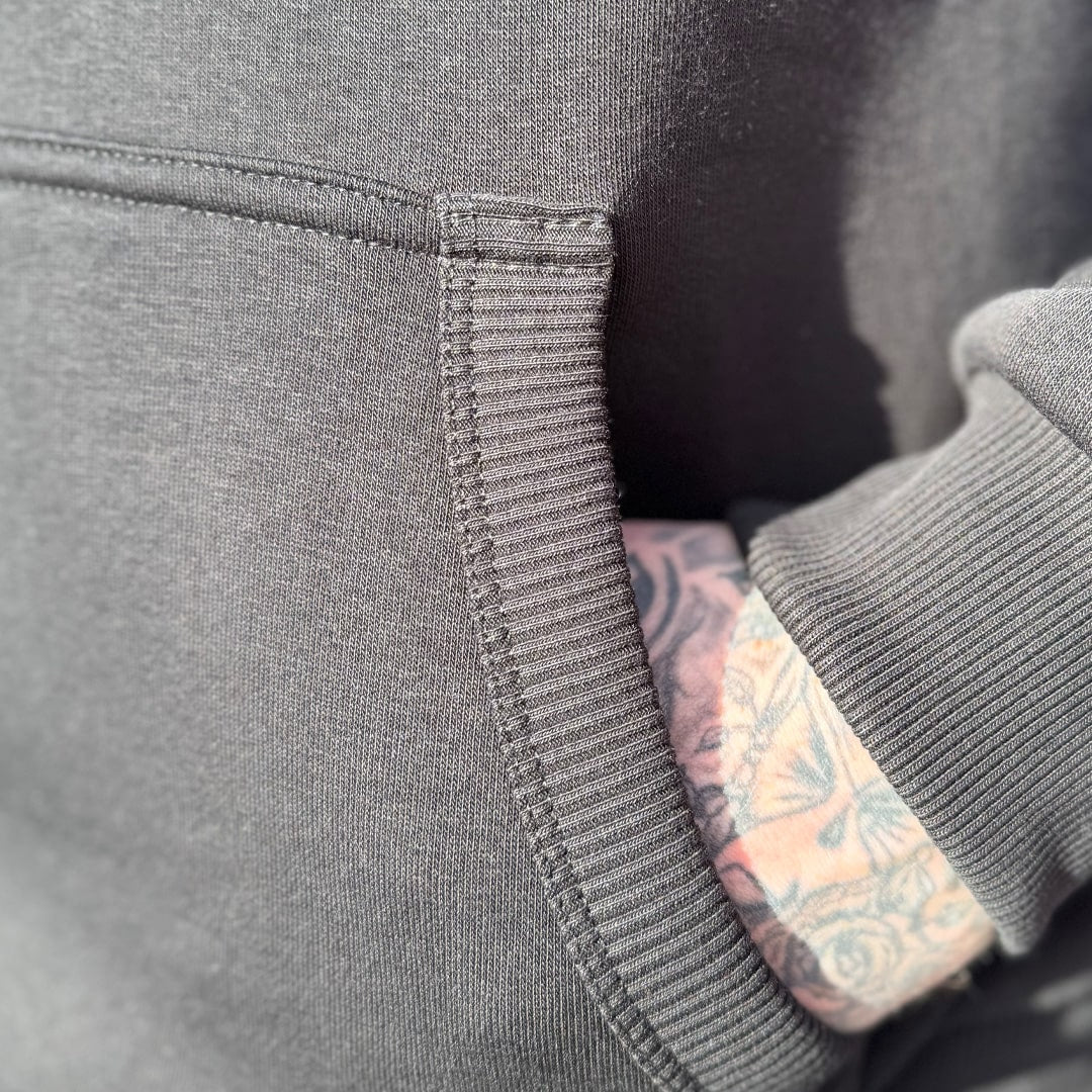 closuep of ribbed hems on kangaroo pocket and cuff on spada hoodie