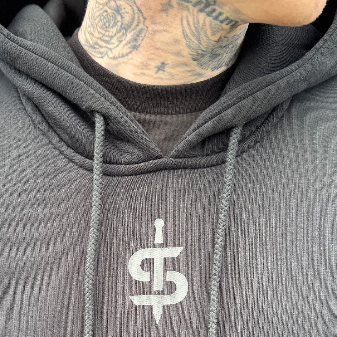 closeup of black spada casual hoodie with logo on chest