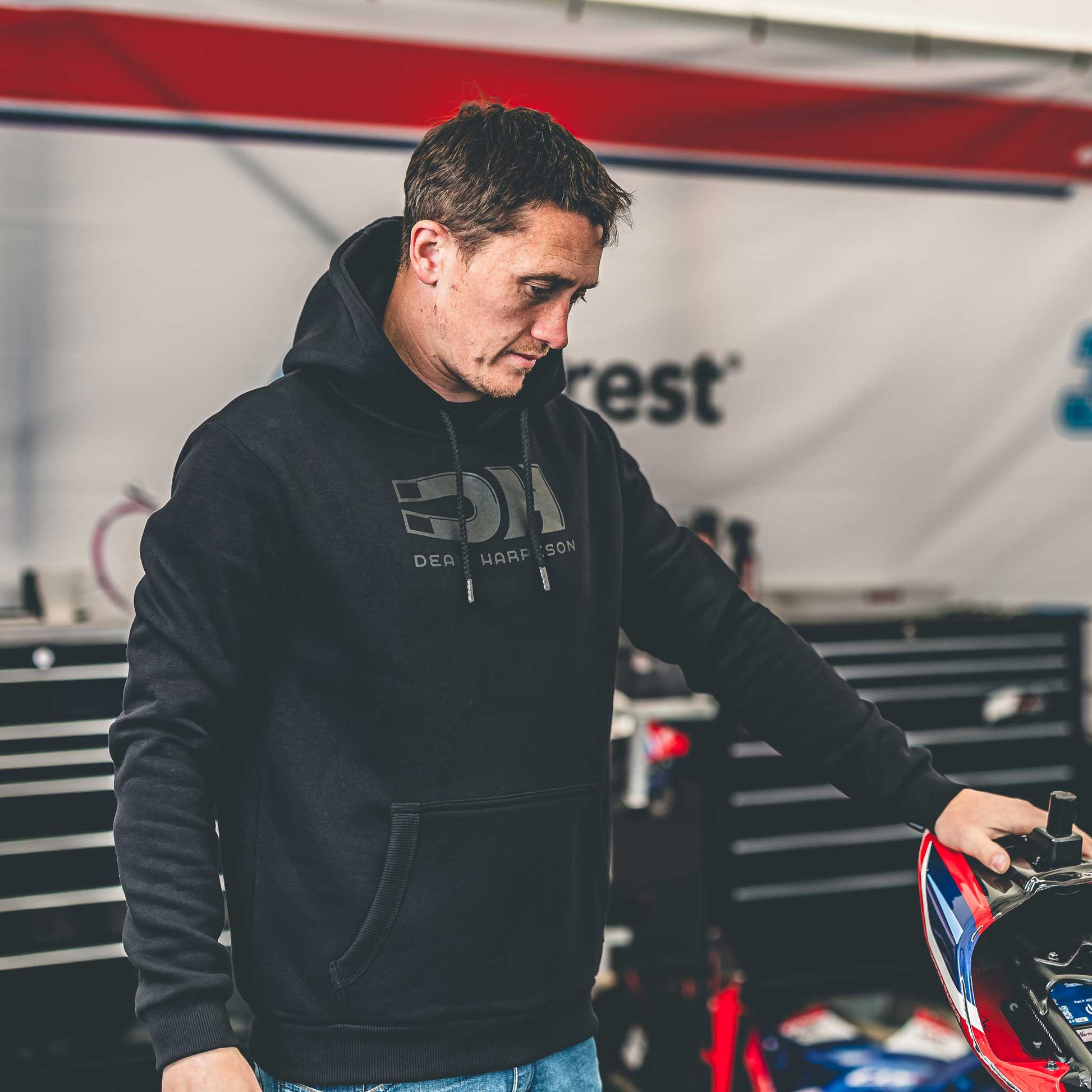 dean harrison tt racer wearing his DH Merch hoodie