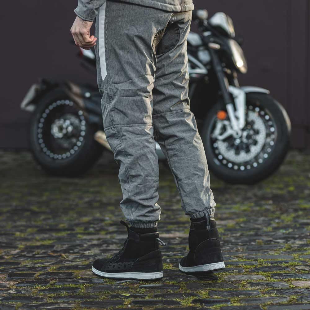 grey reflective motorcycle trousers for commuting with black motorcycle trainers
