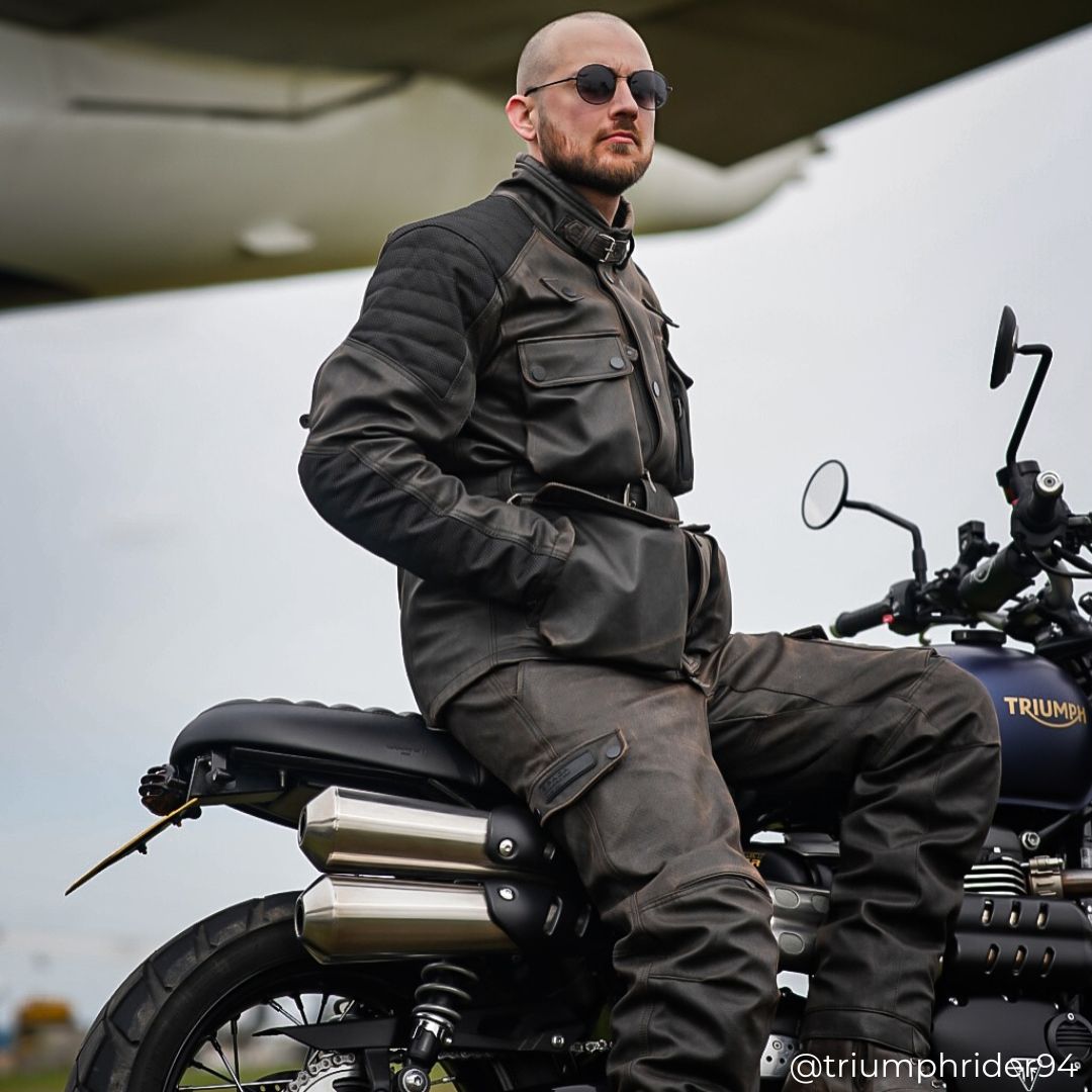male rider sitting on bike in full Crossguard gear, highlighting jacket fit and breathable vents
