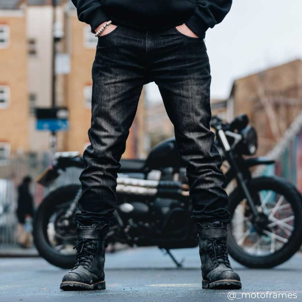 black motorcycle jeans for men paired with black motorcycle boots for motorbike riding