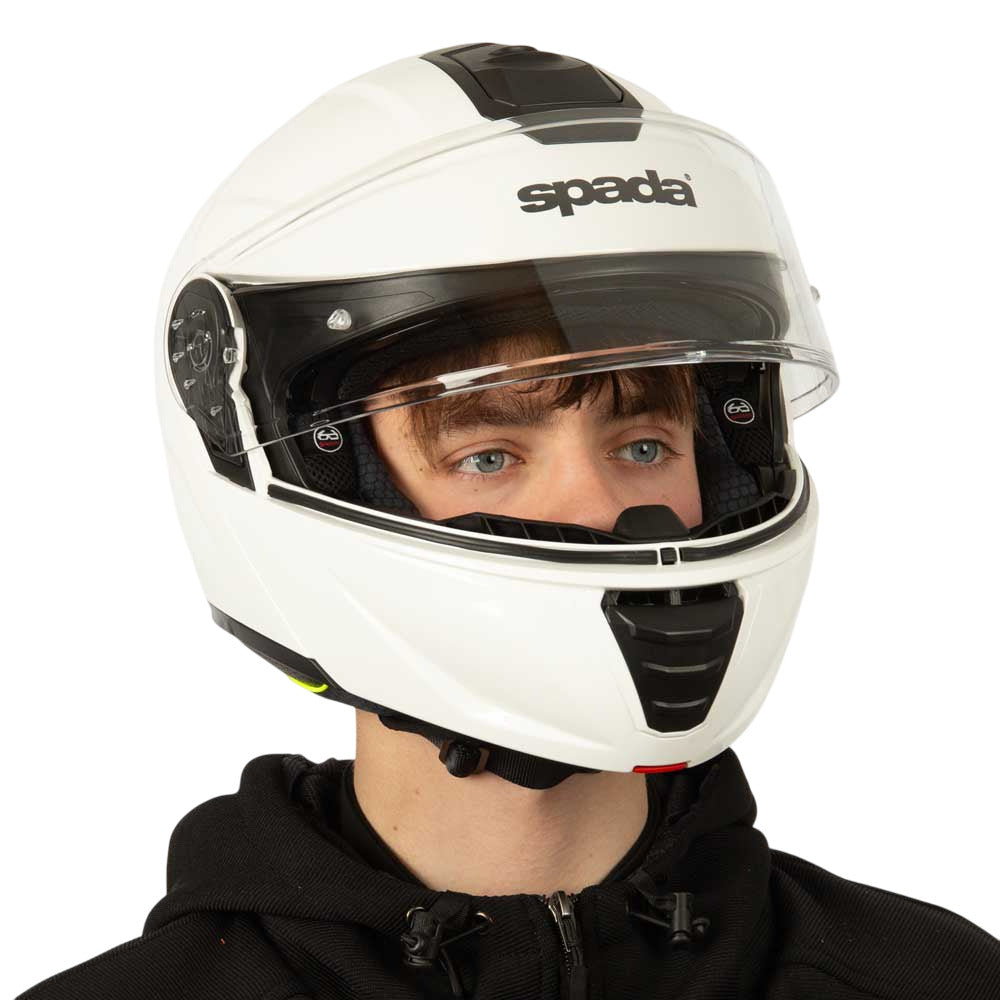 white and black motorbike helmet worn on model