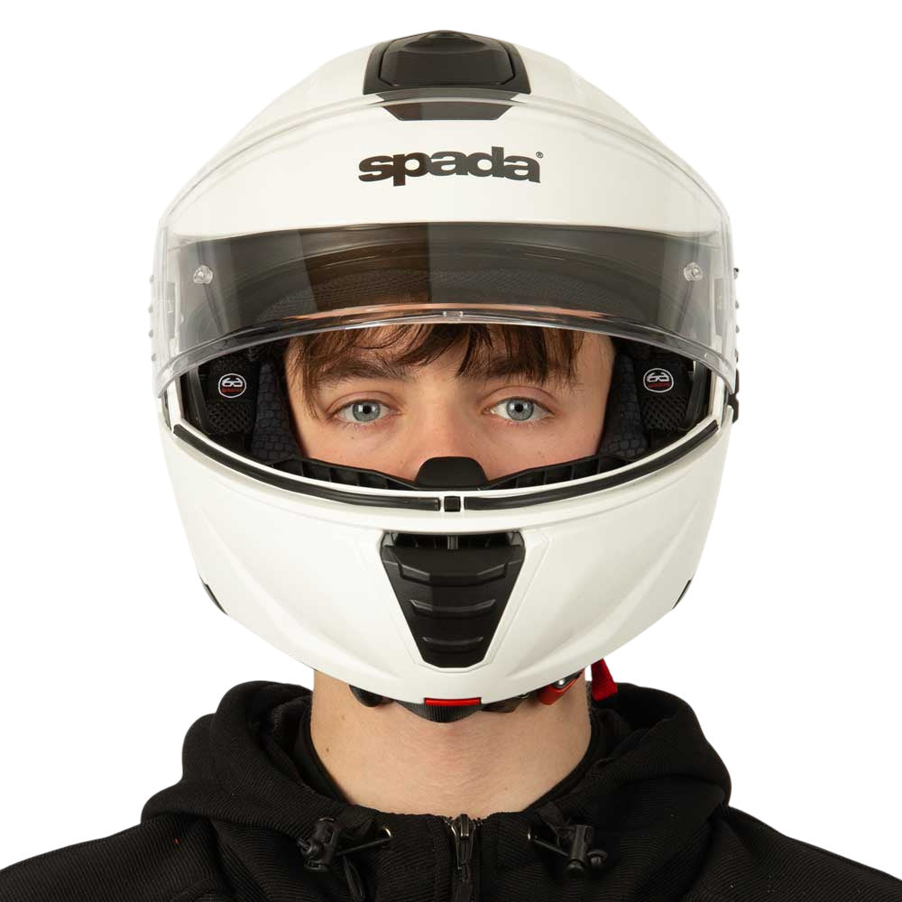 front of white motorbike helmet with clear visor lifted up