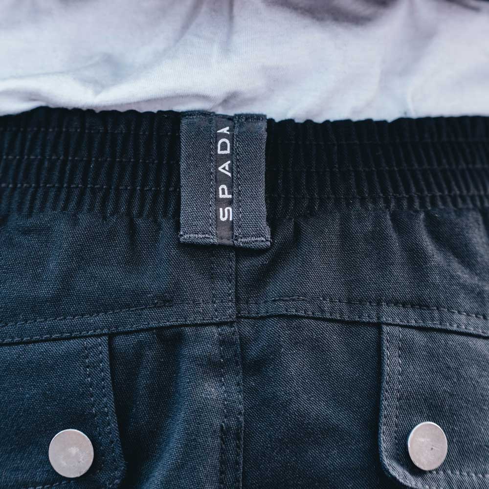 back of black pants with elasticated waist