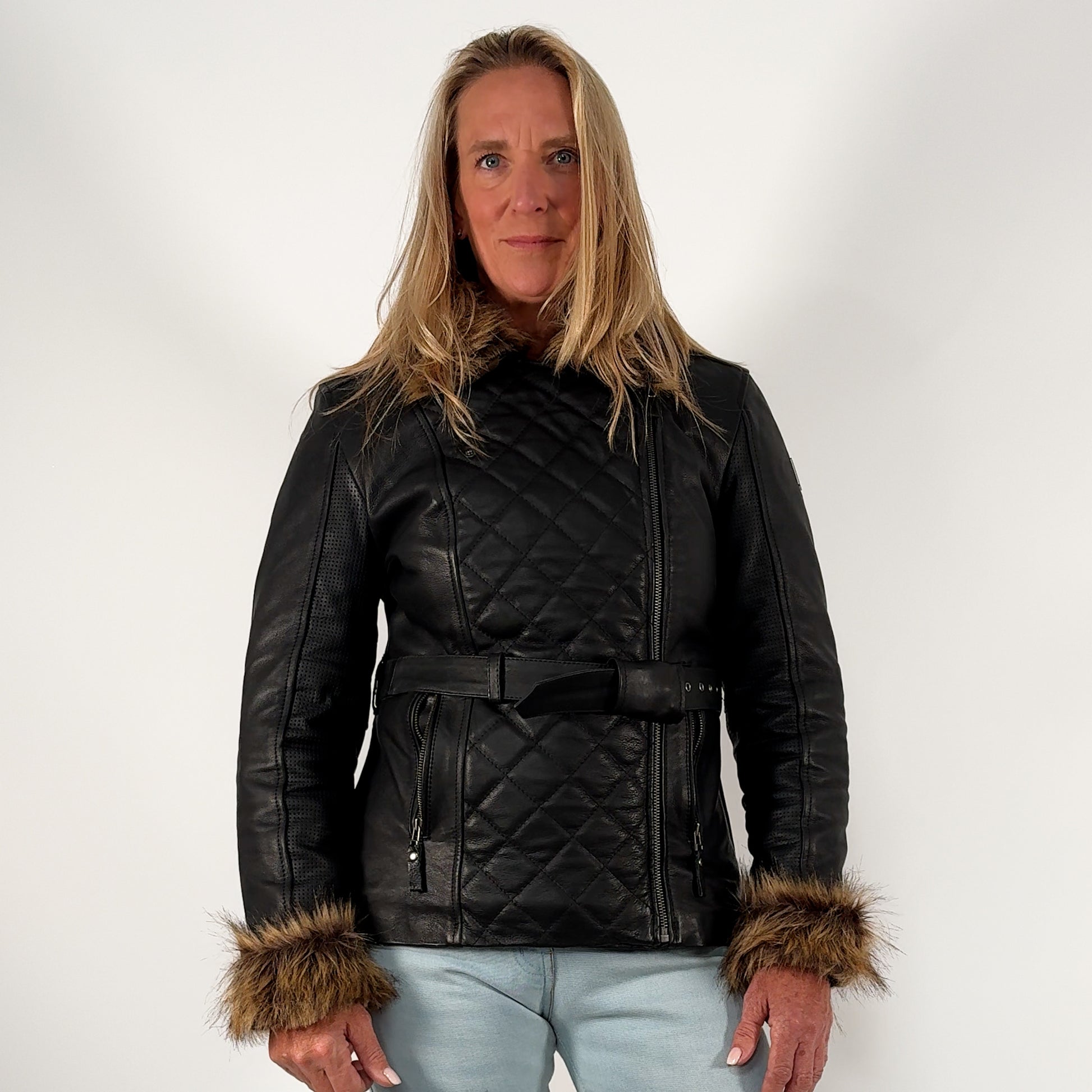 360-degree video of woman wearing female moto jacket black leather ladies motorcycle jacket showcasing fit, faux fur details, and biker styling