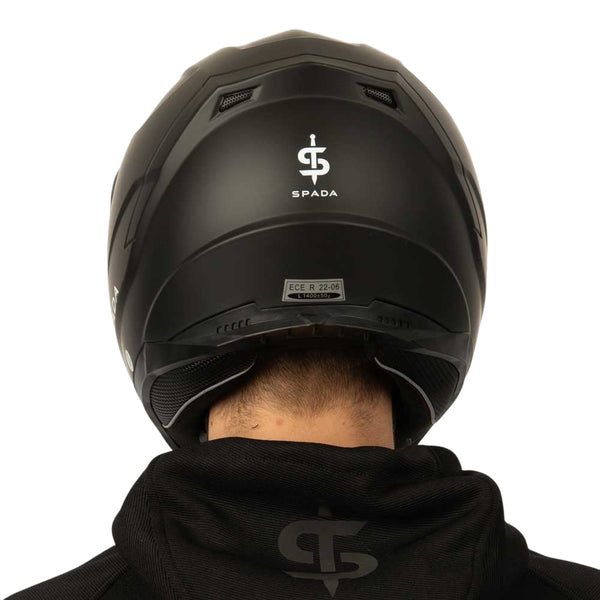 back of matt black motorbike helmet