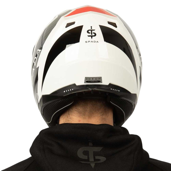 back of white and black and red motorbike helmet