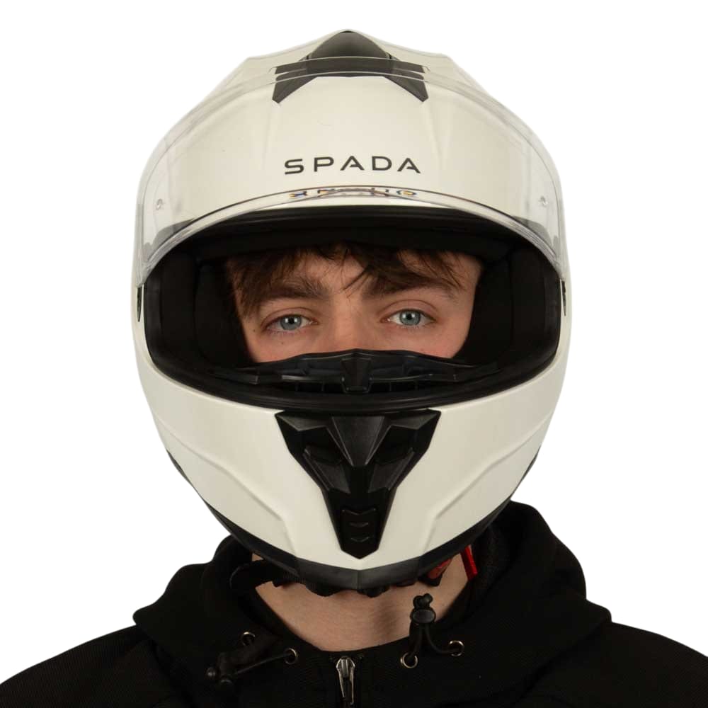 front of white full face motorcycle helmet with clear visor