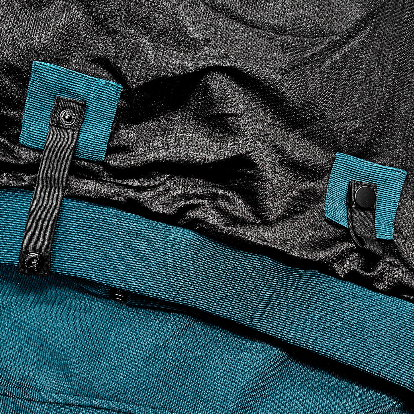 Close-up detail of belt loops on Blade Blue motorcycle hoodie – secure attachment to trousers for safe, stable riding