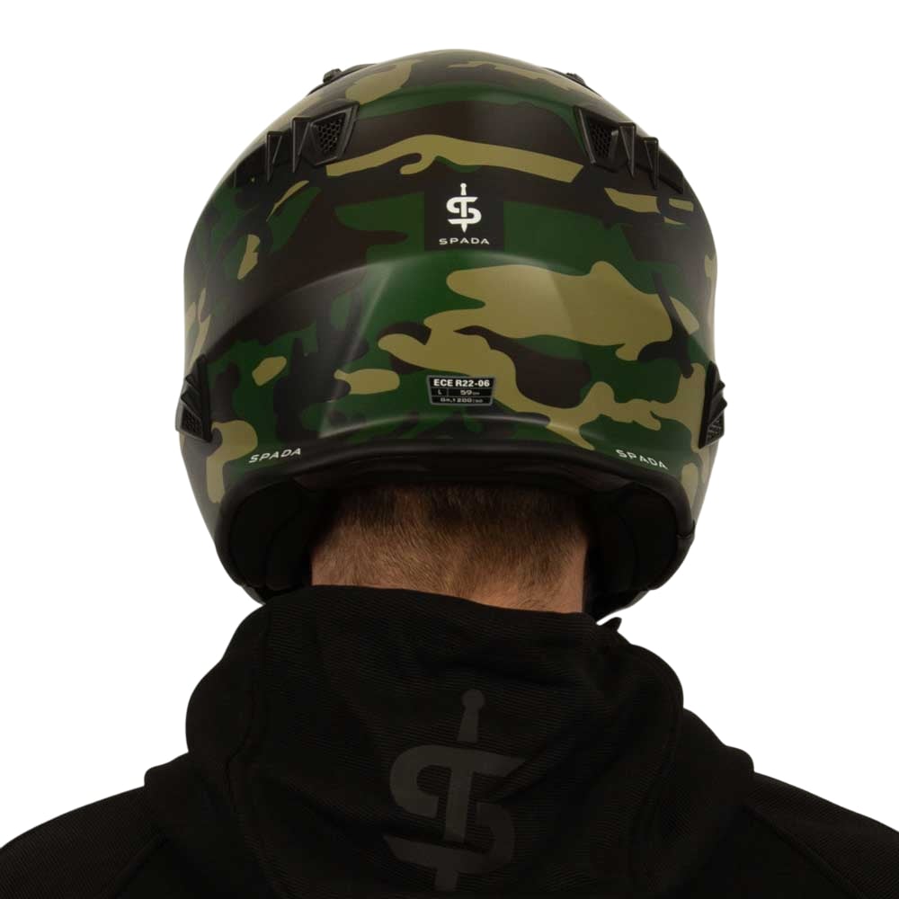 back of green camo motorcycle helmet