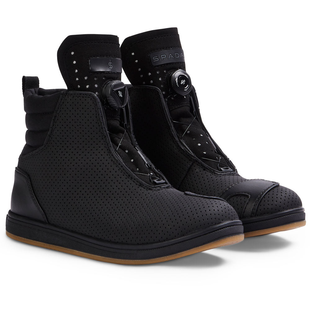 a pair of black waterproof motorcycle trainers with reflective features