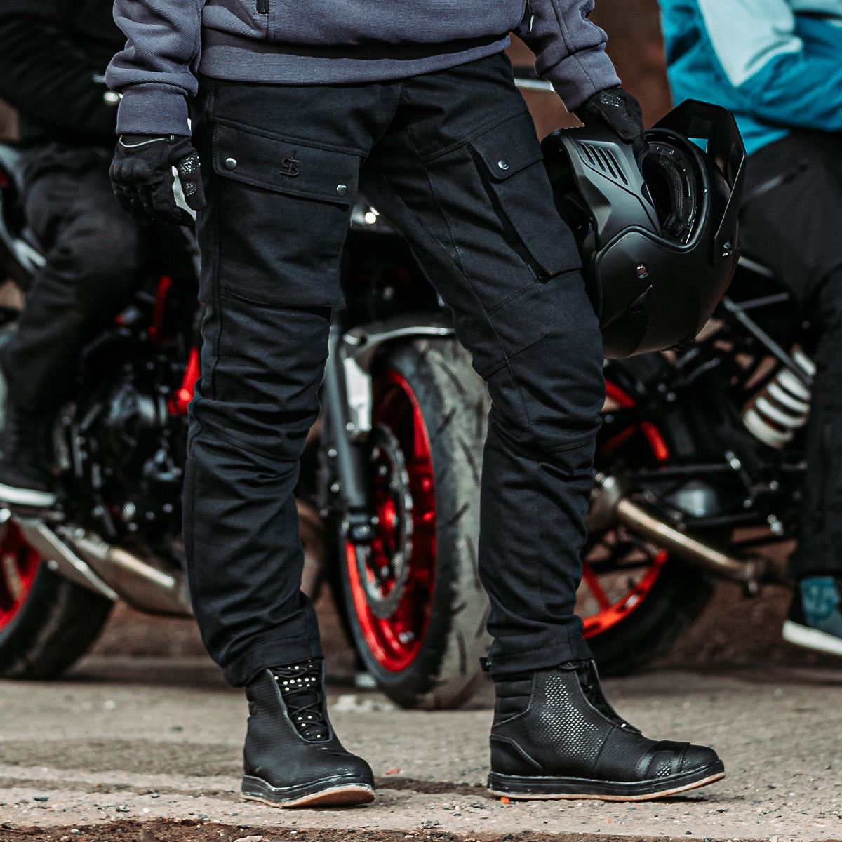 womens black motorcycle trousers with black reflective shoes
