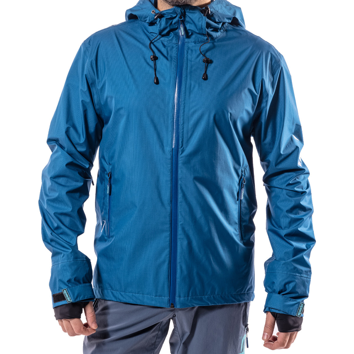A blue mountain biking jacket with a hood, zip pockets, and designed for water resistance.