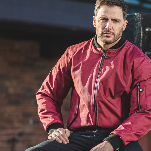 man wearing mens red burgundy motorcycle bomber jacket with comfortable and classic fit