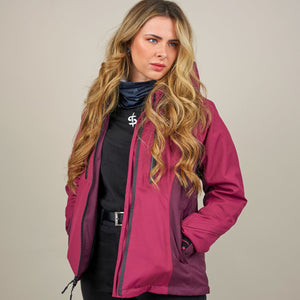 woman wearing the spada lula motorcycle jacket in port red