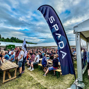 abr festival 2024 with crowd and spada banner and stall exhibiting