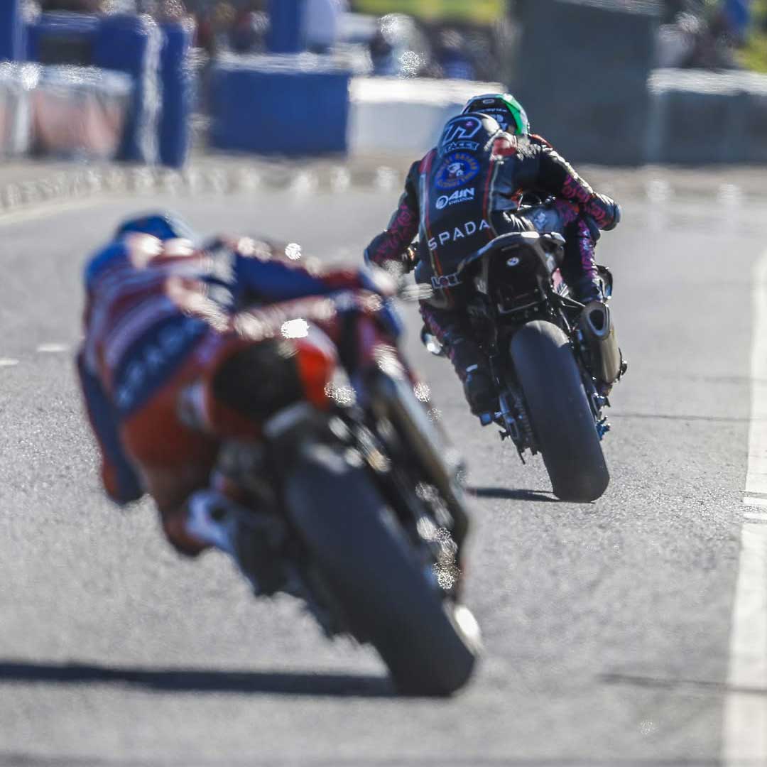 storm stacey and dean harrison racing on motorbikes in the north west 200 race