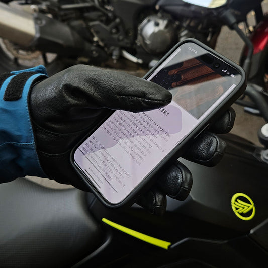 black leather touchscreen friendly motorcycle gloves worn by biker