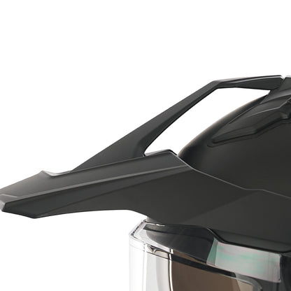 close up of peak windshield on black helmet