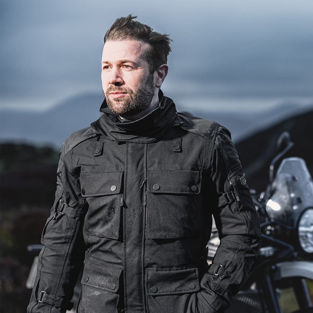 biker wearing black motorcycle jacket