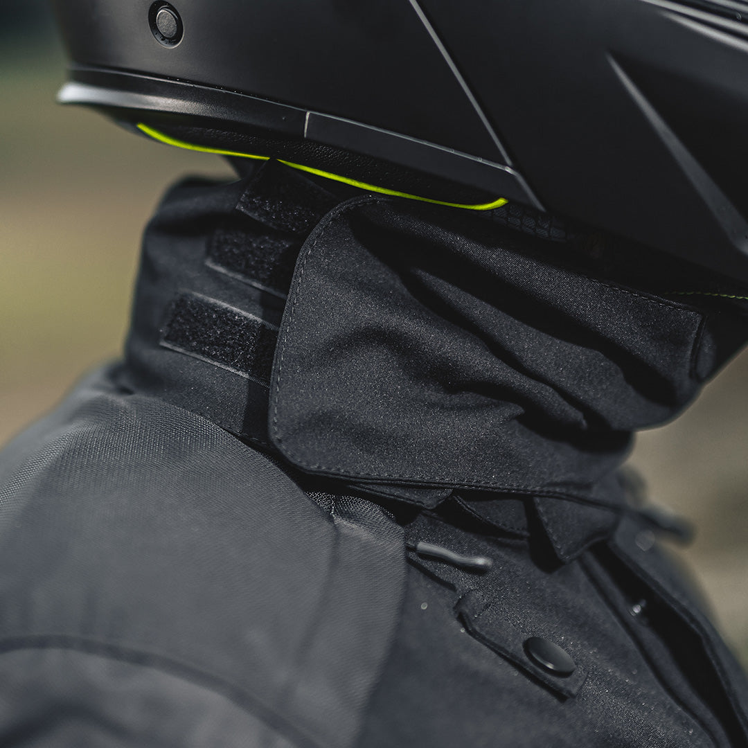 closeup of neck and shoulder features on black jacket for bikers