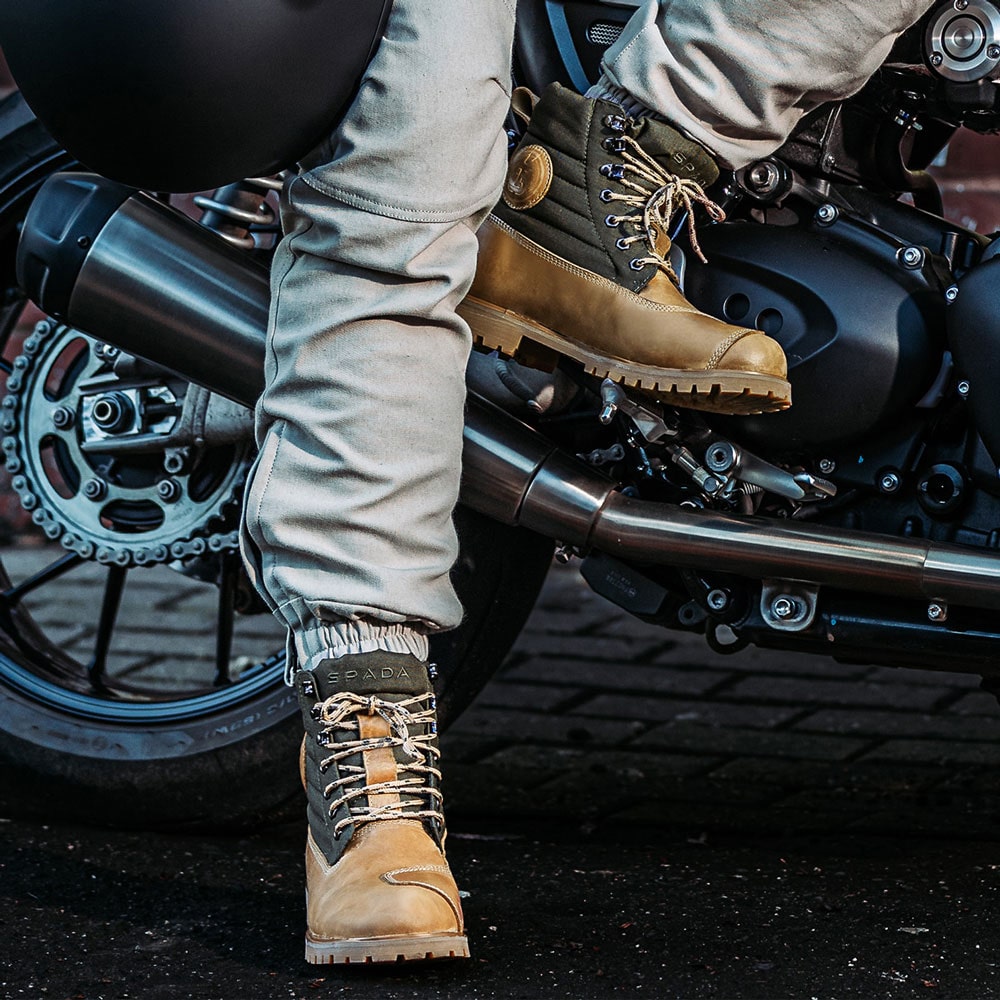 biker wearing brown and green workboot motorcycle boots on bike ride