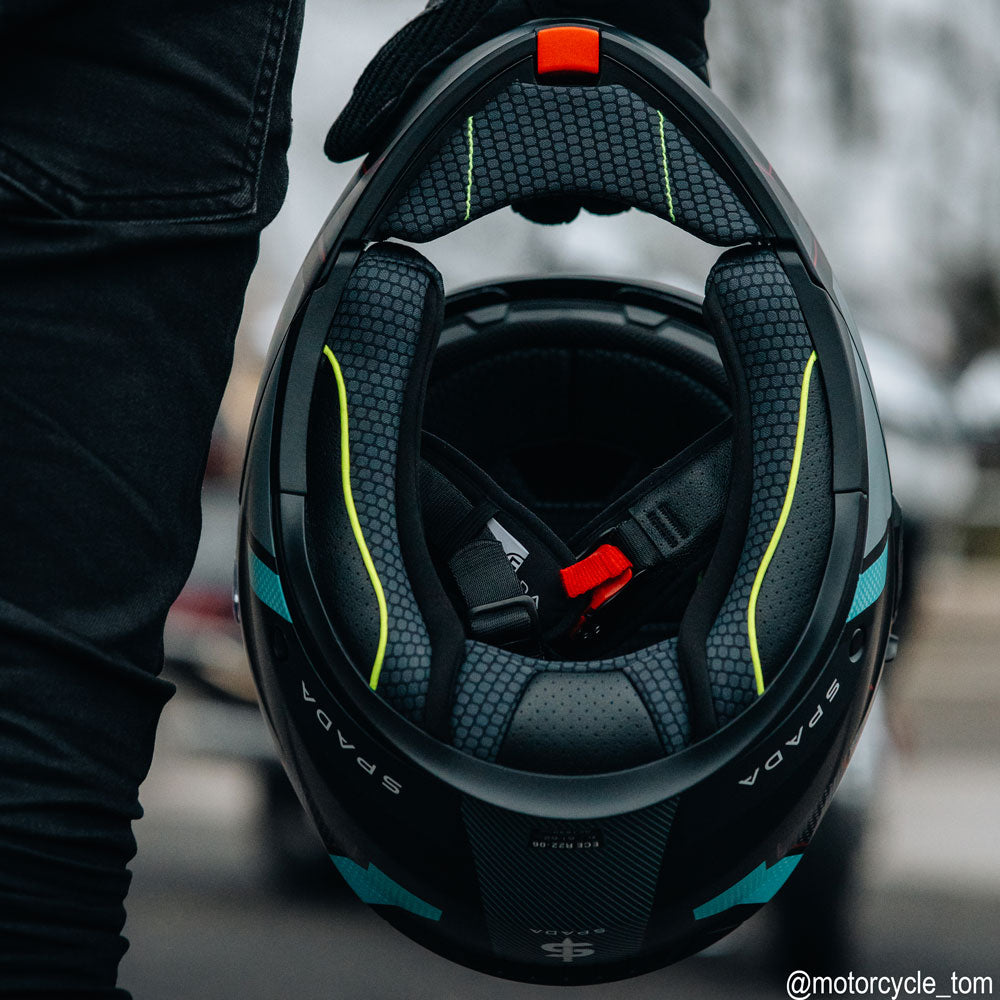 inside view of black and blue flip up motorcycle helmet