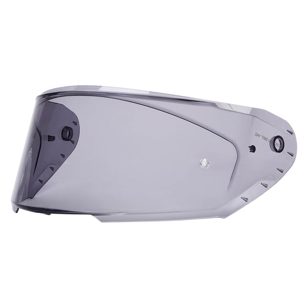 A gray tinted motorbike helmet visor
