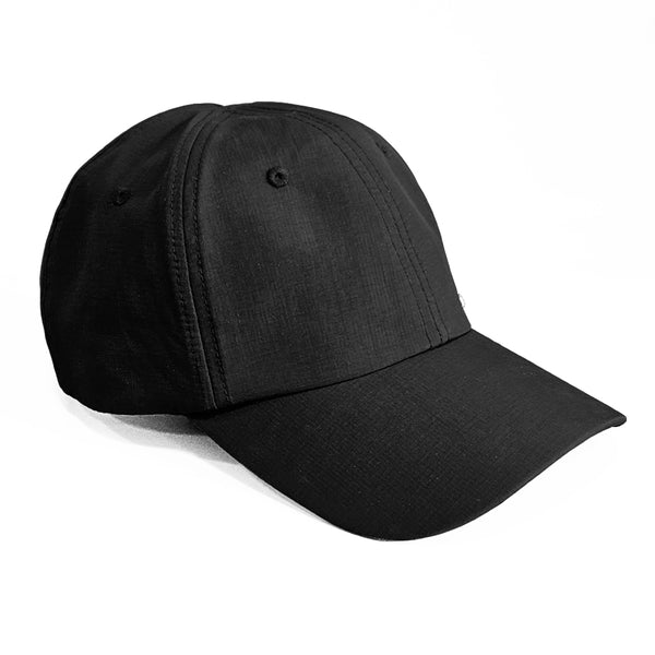 side view of black soft shell cap with curved brim