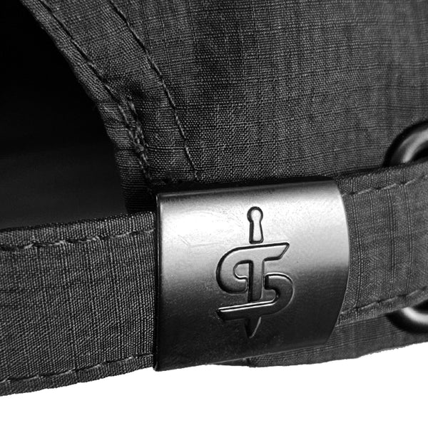 back  closure of soft shell black cap