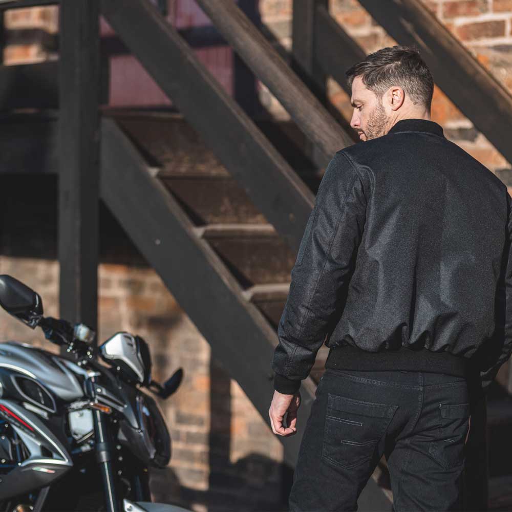 back of biker wearing black bomber jacket for biker men