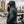 Side and back view of biker in Blade Black motorcycle hoodie with iconic London bridge behind – street-tested urban biker hoodie