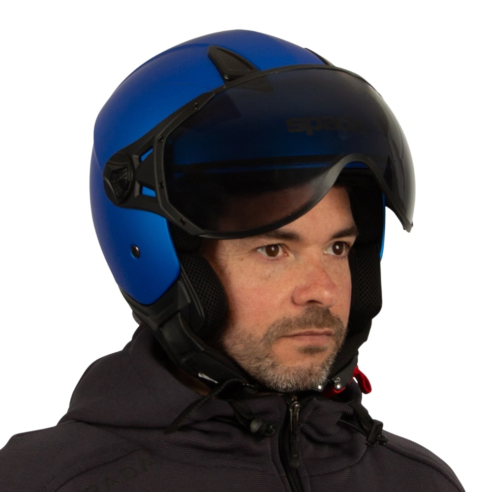 biker wearing matte blue open face motorbike helmet