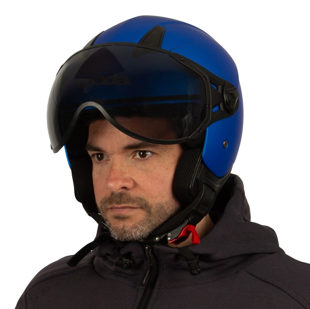 side of matte blue biker helmet with tinted visor