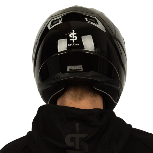 back of glossy full face motorbike helmet in black
