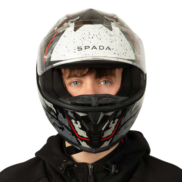 front of black and grey motorbike helmet with red details