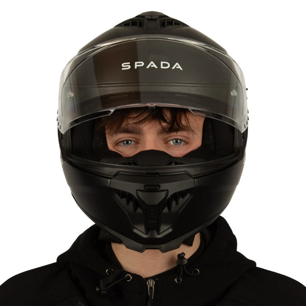 front of full face black motorbike helmet with clear visor