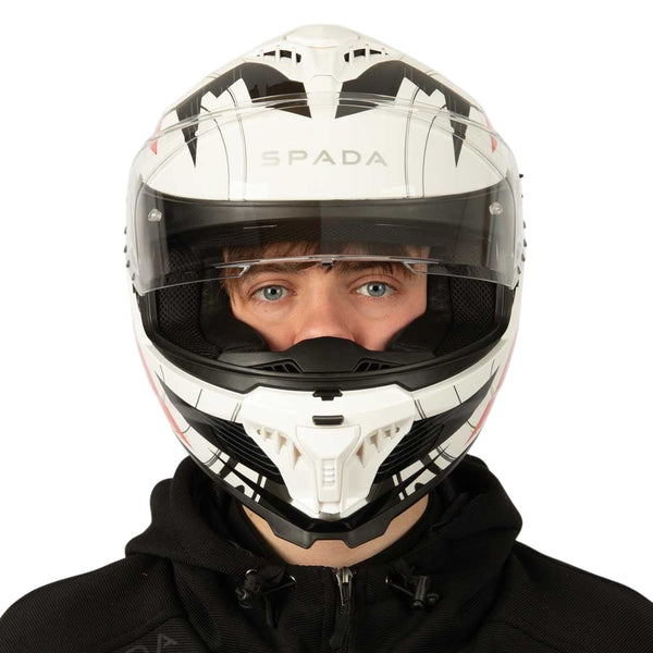 front of black and white motorbike helmet with clear visor