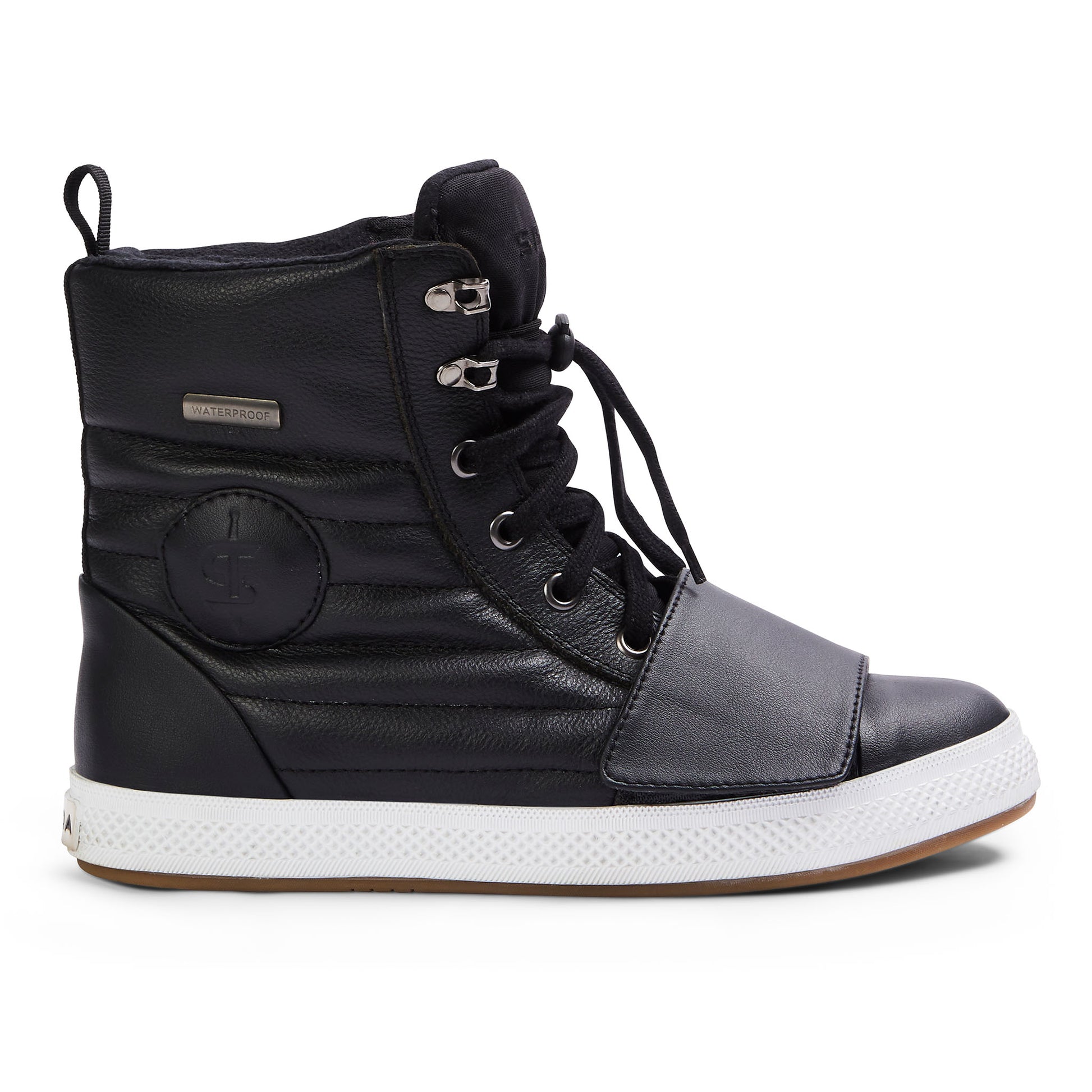 Outer side view of Heat Black motorcycle trainer showing quilted leather and smooth toe cap