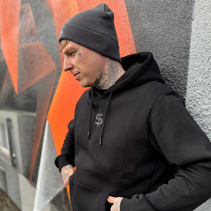 biker wearing black casual spada hoodie and beanie