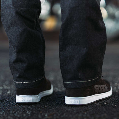 back of brown high top motorcycle trainers