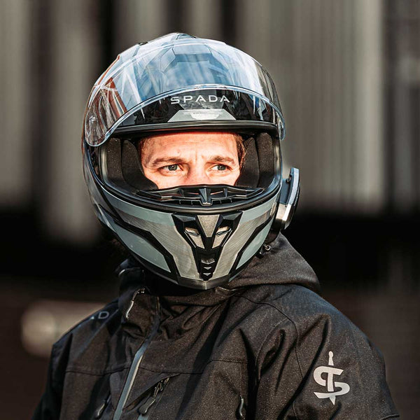 biker wearing motorbike helmet with waterproof motorbike jacket for men