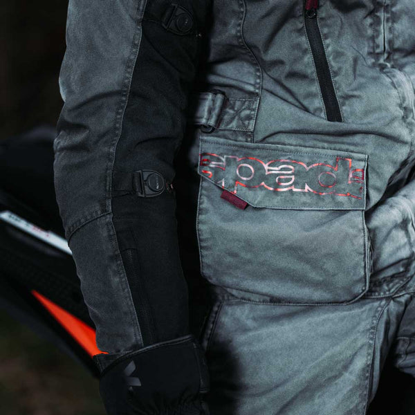 closeup of large storage pockets on motorbike jacket