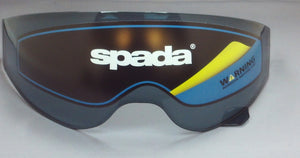 A dark smoke tinted visor for a Spada Storm motorcycle helmet, with the Spada logo and 'WARNING' text on the lower right corner.