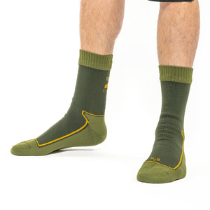 man wearing a pair of two tone olive green socks